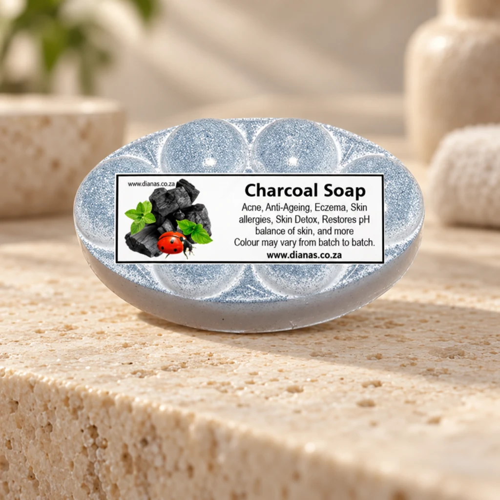 Charcoal Coconut “Bubble” Soap Bar — Diana's product in a warm stone editorial setting